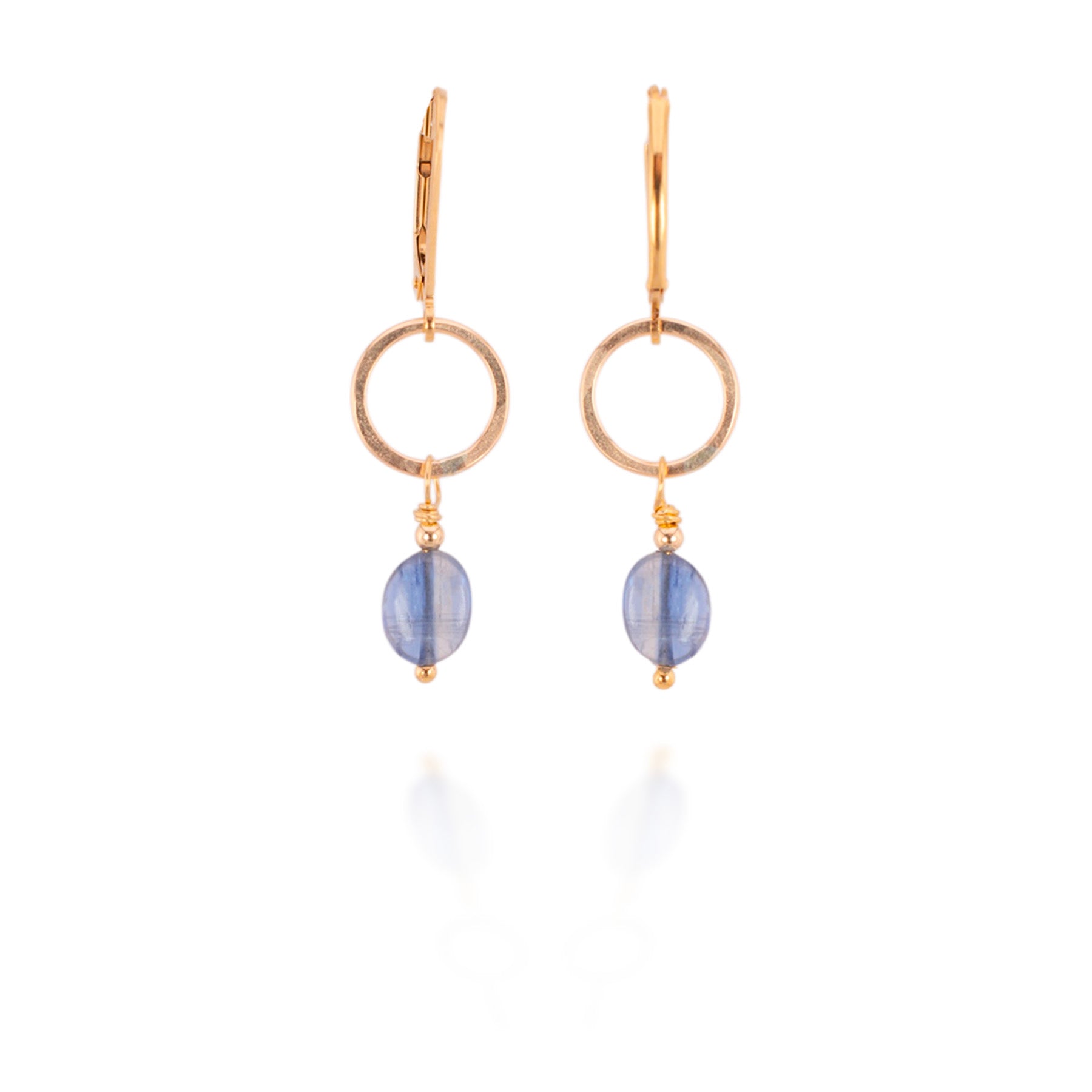 Gold hoop earrings with blue beads on a white background
